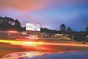 lot and screen at dusk, right before a show