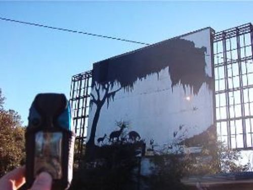 Pic of the drive in mural. httpimg.groundspeak.comwaymarkingdisplayc29ada29-7622-4de0-934f-97f2eb1b394b.jpg