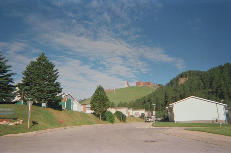 Mile Hi in 2013 with remains of the Homestake Gold mine behind.