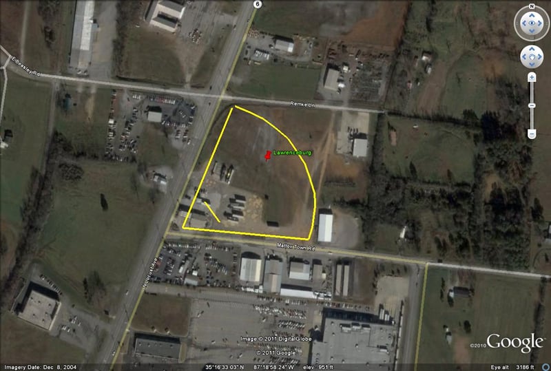 Google Earth image outline of former site-now a gas station and empty field