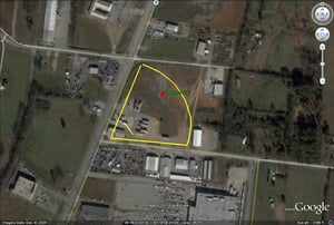 Google Earth image outline of former site-now a gas station and empty field