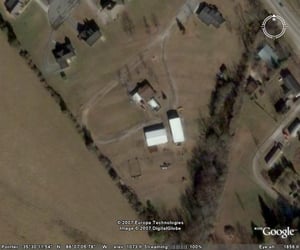 aerial photo of manchester drive-in.the only stand left standing is the concession stand which had been turned into a welding shop.