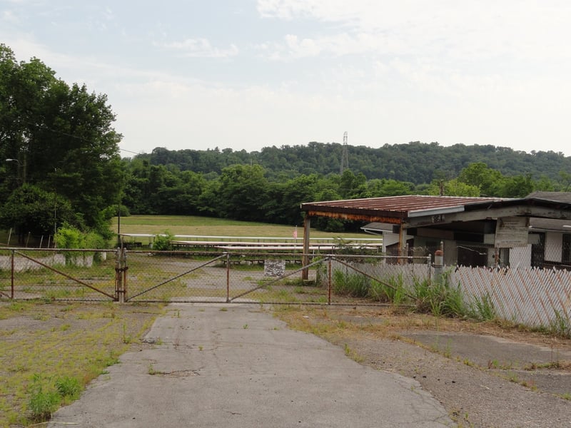 Entrance and former site