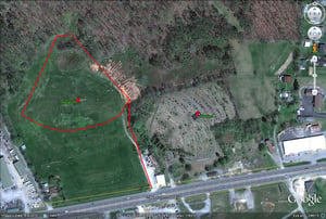 Google Earth image of former site still visible as the right side drive-in