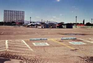 Lot with skeleton of screen tower and the building
