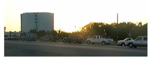 Sundown at the Brazos Drive-In...Cars waiting in line...Growing popularity.