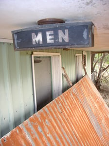 MENS Restroom Sign. Still hanging on!