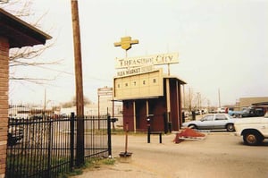 marquee and entrance with an old speaker pole in the foreground