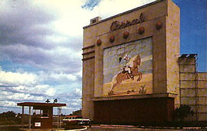 Photo showing the  mural on the front of the screen and the ticket booth.