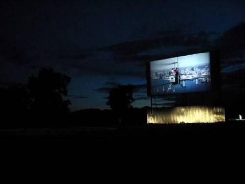 Just after dusk at the Corral Drive-in: An exhuberant patron takes it upon himself to highlight the screen skirting with his headlights for a few minutes after the show starts..!