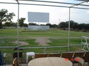 looking out at the screen from the concession stand