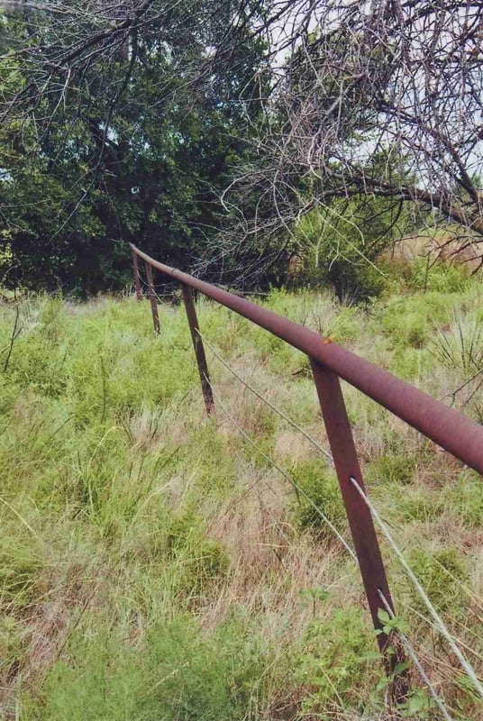 Remains of perimeter fence.