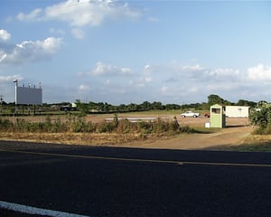 View from across the road: screen, ticket booth, and concessions/projection building