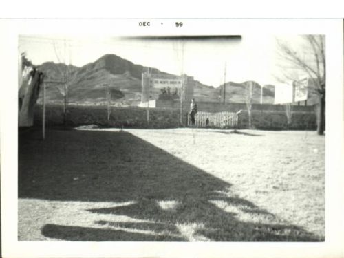 Its not too sharp but there it is with the Franklin Mountains behind. Actually, thats Sugerloaf mtn. Taken from my backyard with my brother at the gate. The strip center on this side of Dyer St. was being built so the front of the theatre was blocked when