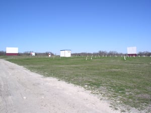 Screens #2 & #3. You can also see the projection booth in the field.