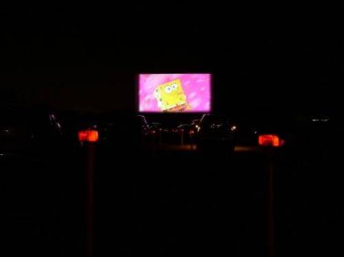 The #2 Screen. The Movie showing is None other than "SpongeBob". (Obvious huh?) A crystal clear picture.! And excellent sound as well.! The Red Lights is a "Walk-way" thru the middle of the lot.