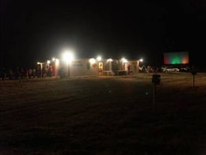 Patrons line up at the snack bar before showtime.