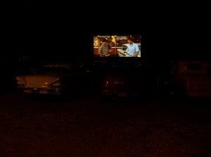 Toad, Curt, and Steven and his 1958 Impala. Notice the '58 Impala on the left and the Little Yellow Coupe on the Right.
From the Movie..American Graffiti..