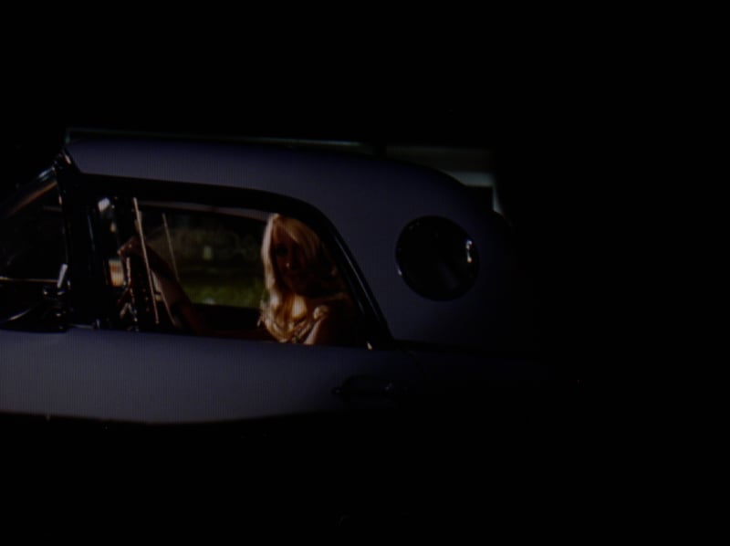 The "Blonde" in the 56 T-Bird.

From the Movie..American Graffiti..