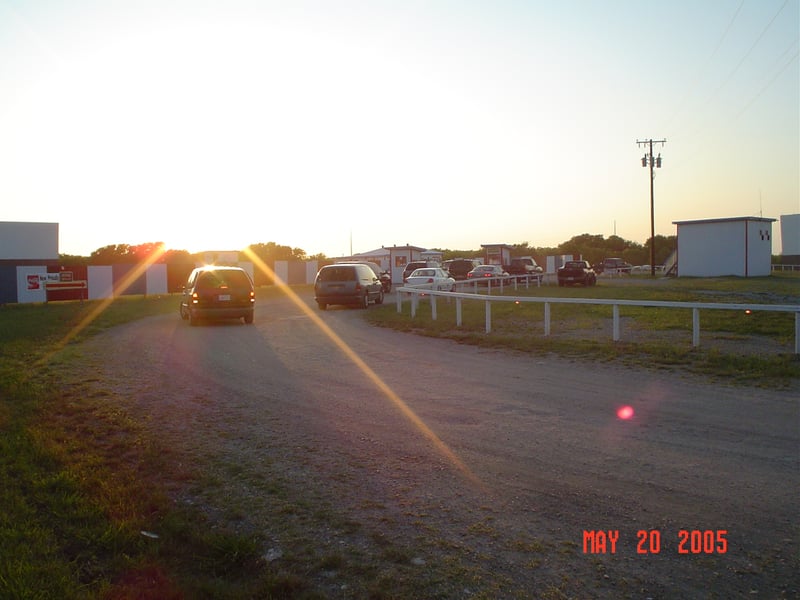 cars lining up at the ticket booth on a Friday night