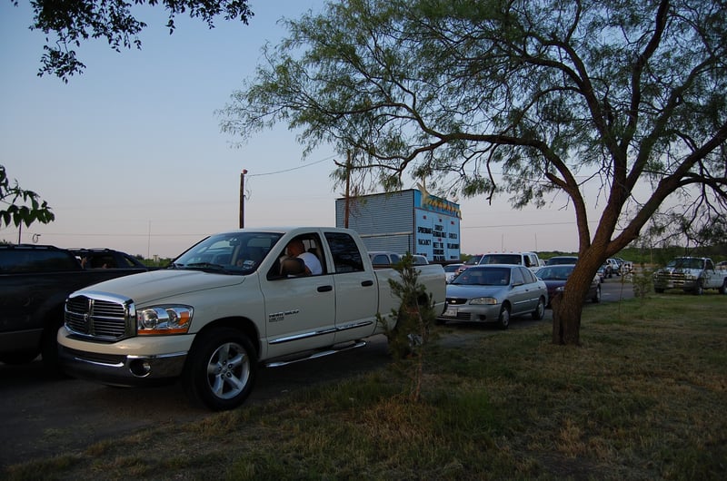 Some of the Regulars in the White Dodge Truck, coming to the Drive In! Great bunch of Folks! They KNOW Where to go for Great Movie Entertainment.