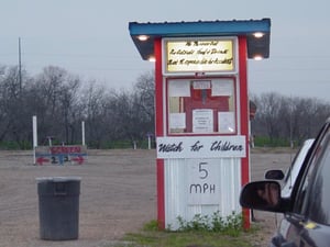 Paying at the ticket booth.