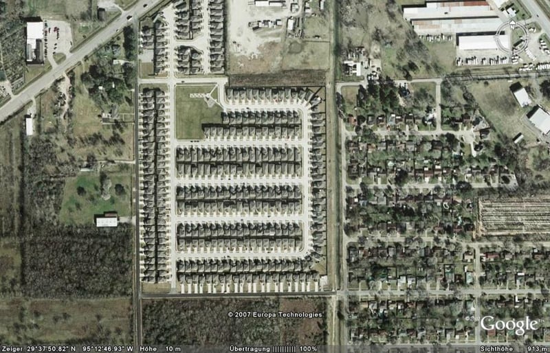 Aerial view of the former drive-in site with  housing construction completed