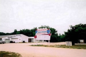This photo shows the marquee, arcade, and the sign for the auto repair place. I was disappointed about how this photo turned out when scanned, so I did it over. Please see the next photo.