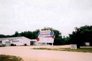 This photo shows the marquee, arcade, and the sign for the auto repair place. I was disappointed about how this photo turned out when scanned, so I did it over. Please see the next photo.