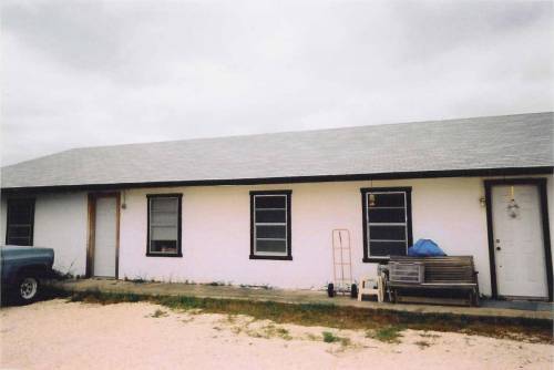 This is the old concession/projection building but you wouldn't know it from this photo. It has been turned into a residence. Is that the projectionist in the window? See the next photo.