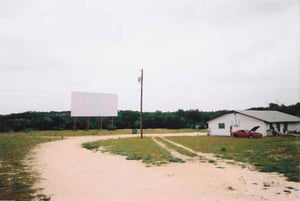 One last look at the screen and old concession building that is now a house. The woman who lives there ended up in the picture at the corner of the house but you can't see her with the low resolution of the scan.