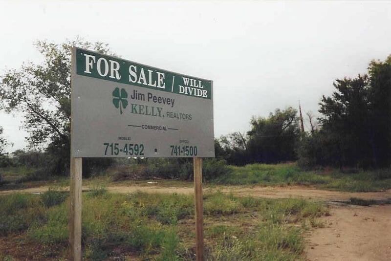 A sign of the times. The Joy Drive-In is for sale. This sign was erected near the exit. The screen is in the background to the right.