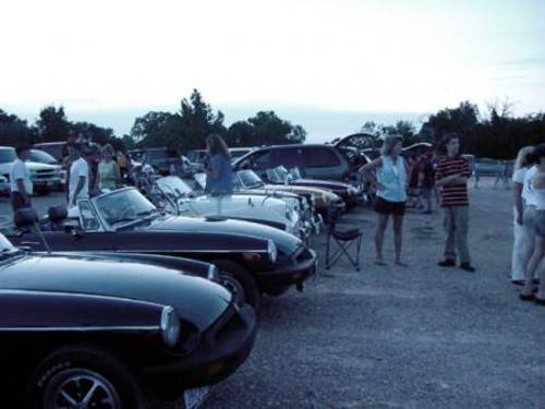 7 cars from Capital City MG Club and Hill Country Triumph Club at a sold out night 7/12/2004