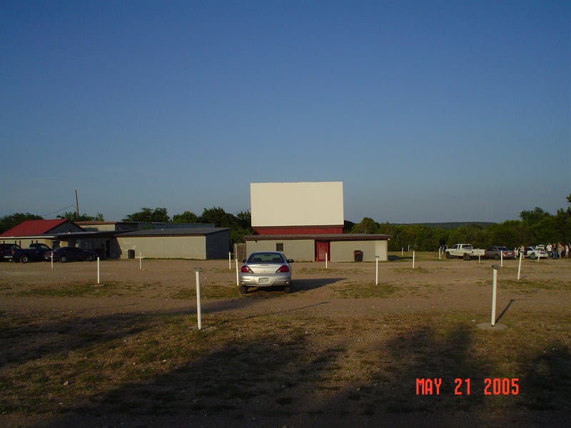 This is my rental car parked behind the projection/restroom building. This building had the concession stand in it at one time. The concession stand is now located in the big building with the indoor theater.