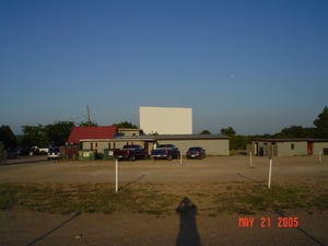 This photo shows that even if you park behind the indoor theater, you can still see the screen if you park in the back two rows. The lot really fills up on the weekends, and people have to park here sometimes.