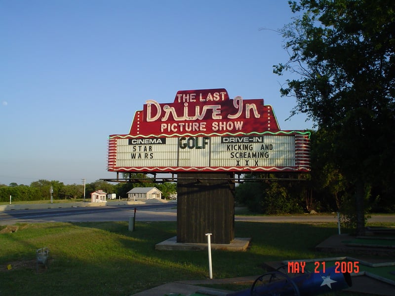 Here's a pic showing what the marquee looks like before sundown. The cannon, from one of my favorite miniature golf course holes, shows up in the lower-right hand corner of the photo.