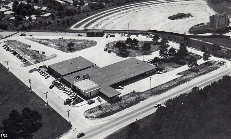 Aerial view of the then Gulf States Utilities (left) and the MacArthur Drive-In Theatre (right)