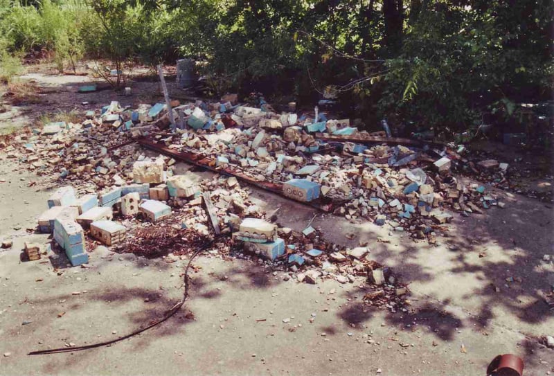 Debris of a ticket booth. They once were painted light blue