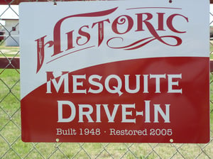Sign stating when built and when restored. Not sure on the restored part. This would be a nice Drive In fixed up.!