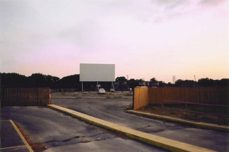 Looking through the opening in the fence toward screen 4. The exit is toward the right. Don't come in through the exit. It has tire guards with spikes in it.