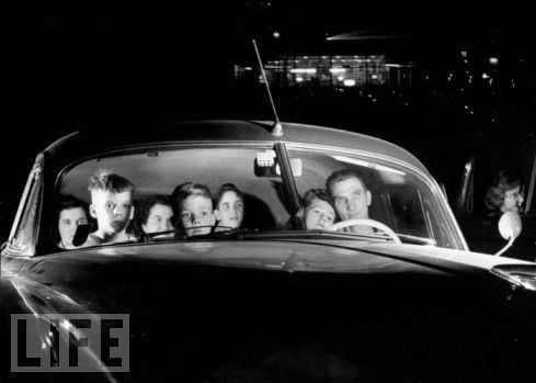 A happy family at a Drive-In Theater