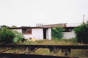 Concession/projection building with outdoor seating. The projection booth is on the right side of the photo.