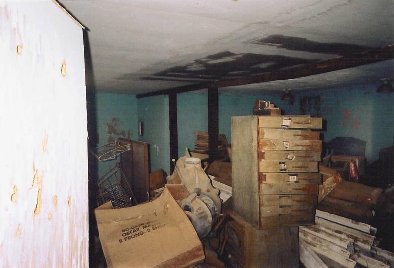 This is the inside of the front portion of the concession/projection building. The projection booth was probably up front. See the old lamphouse?