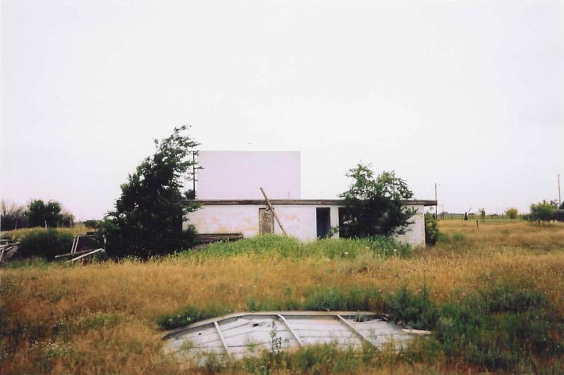 Screen tower and concession/projection building. Is that an old sign in the foreground.