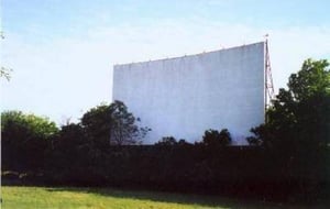 another screen pic(and a clearer one than the one up), which shows that the trees are starting to sadly overgrow it.... (from driveintheater.com)