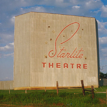 The Starlite Theatre, near Brenham, Texas. The theatre had been closed for some time. The spots in the neon stars are bird's nests. Photo courtesy of Damian Hevia.