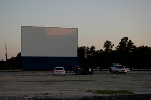 Showboat screen at dusk, with sunset seen through the screen.