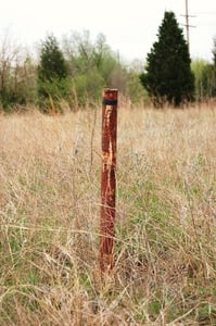 One of a number of speaker poles still standing