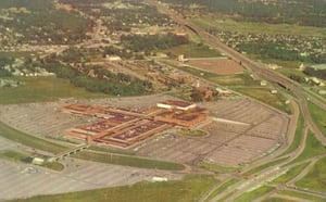 1956 aerial photo of Gulfgate Shopping City in Houston, Texas.  You can see the Winkler Drive-In Theatre in the background.