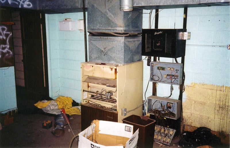 Inside the projection booth, note the equipment left behind.